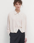 LAYERED BLOUSE WITH TUCKED HEM