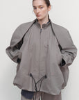 VOLUMINOUS BOMBER WITH DRAWSTRING