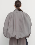 VOLUMINOUS BOMBER WITH DRAWSTRING