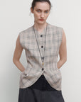 VEST WITH DRAPED SIDES