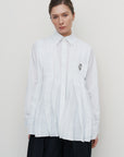 PEPLUM-PLEAT SHIRT