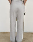 PANTS WITH FRAYED-EDGE SIDE STRIPES