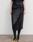 ASYMMETRIC LEATHER MIDI SKIRT