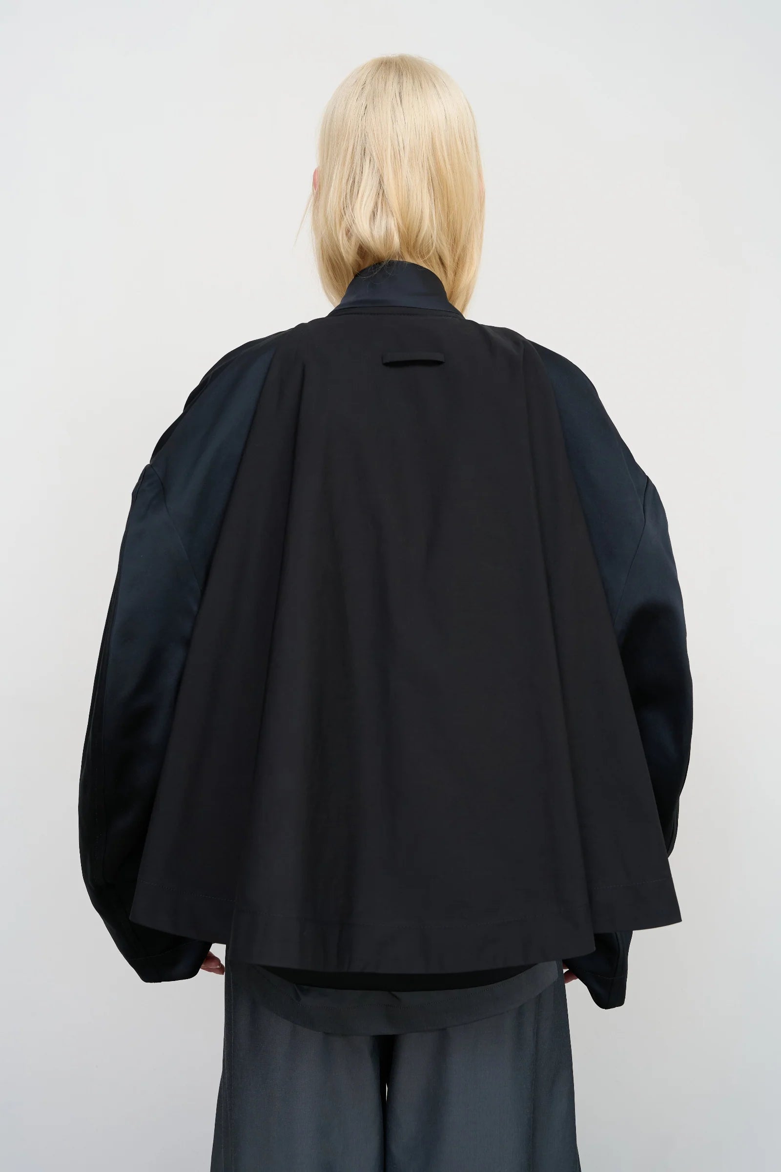 BLACK CAPE OVERLAY BOMBER JACKET