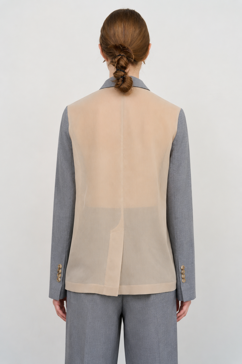 DECONSTRUCTED BOMBER-STYLE CAPE
