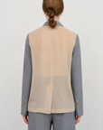 DECONSTRUCTED BOMBER-STYLE CAPE