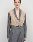 DECONSTRUCTED BOMBER-STYLE CAPE