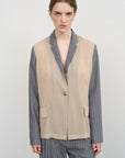 DECONSTRUCTED BOMBER-STYLE CAPE