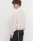 LAYERED BLOUSE WITH TUCKED HEM