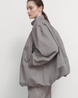 VOLUMINOUS BOMBER WITH DRAWSTRING