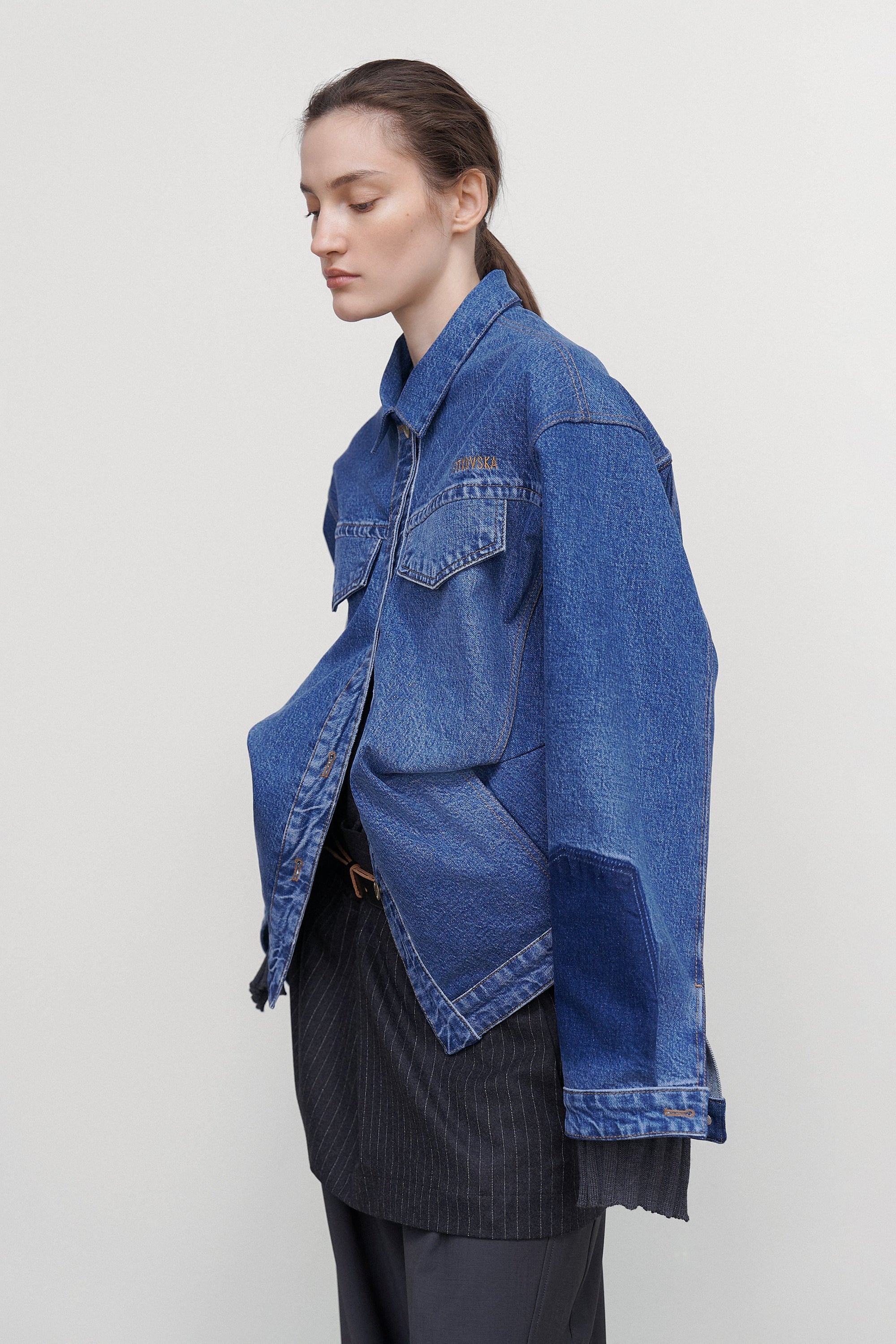 DENIM JACKET WITH DRAPED SIDES