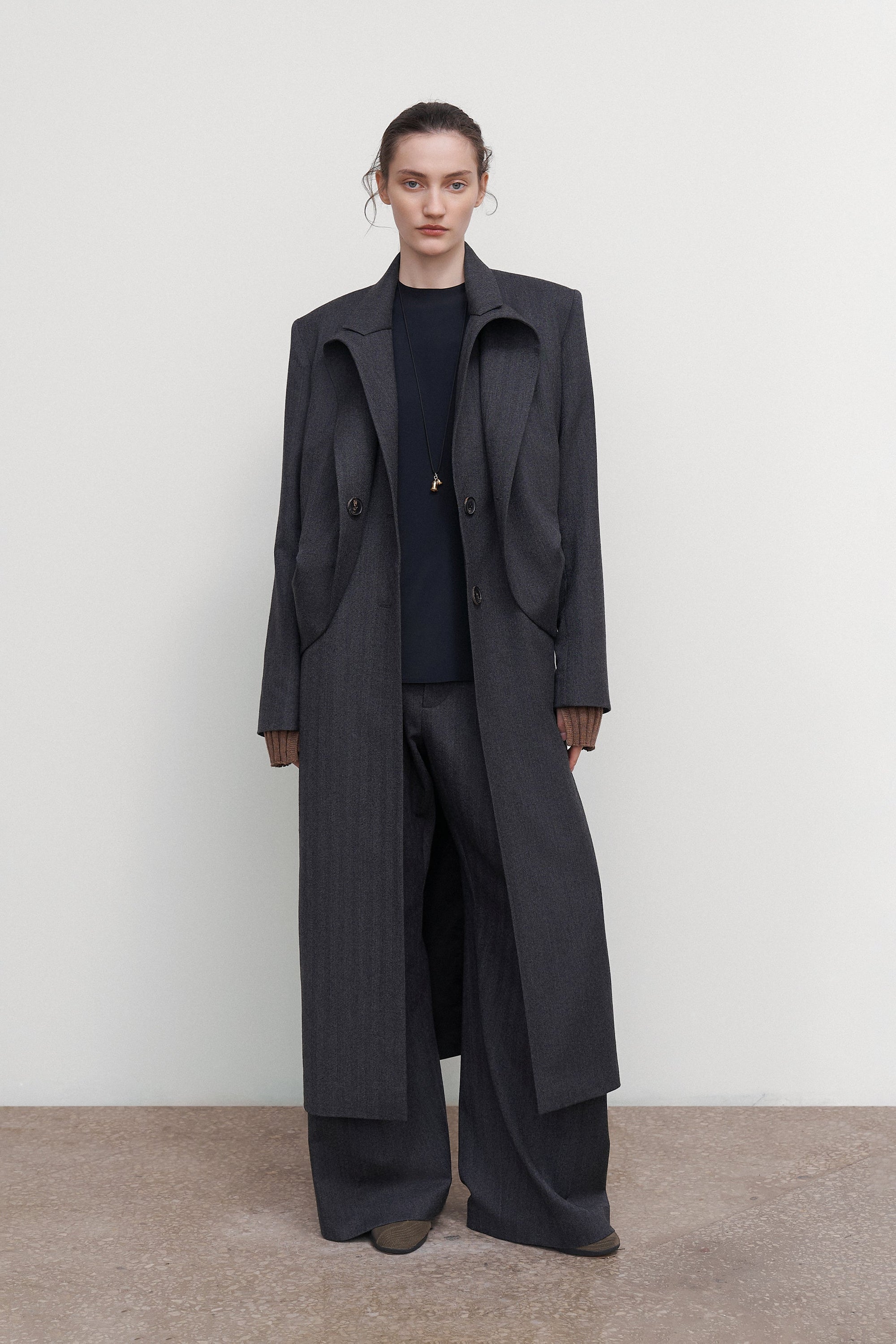 WOOL COAT WITH ANGULAR DETAILING