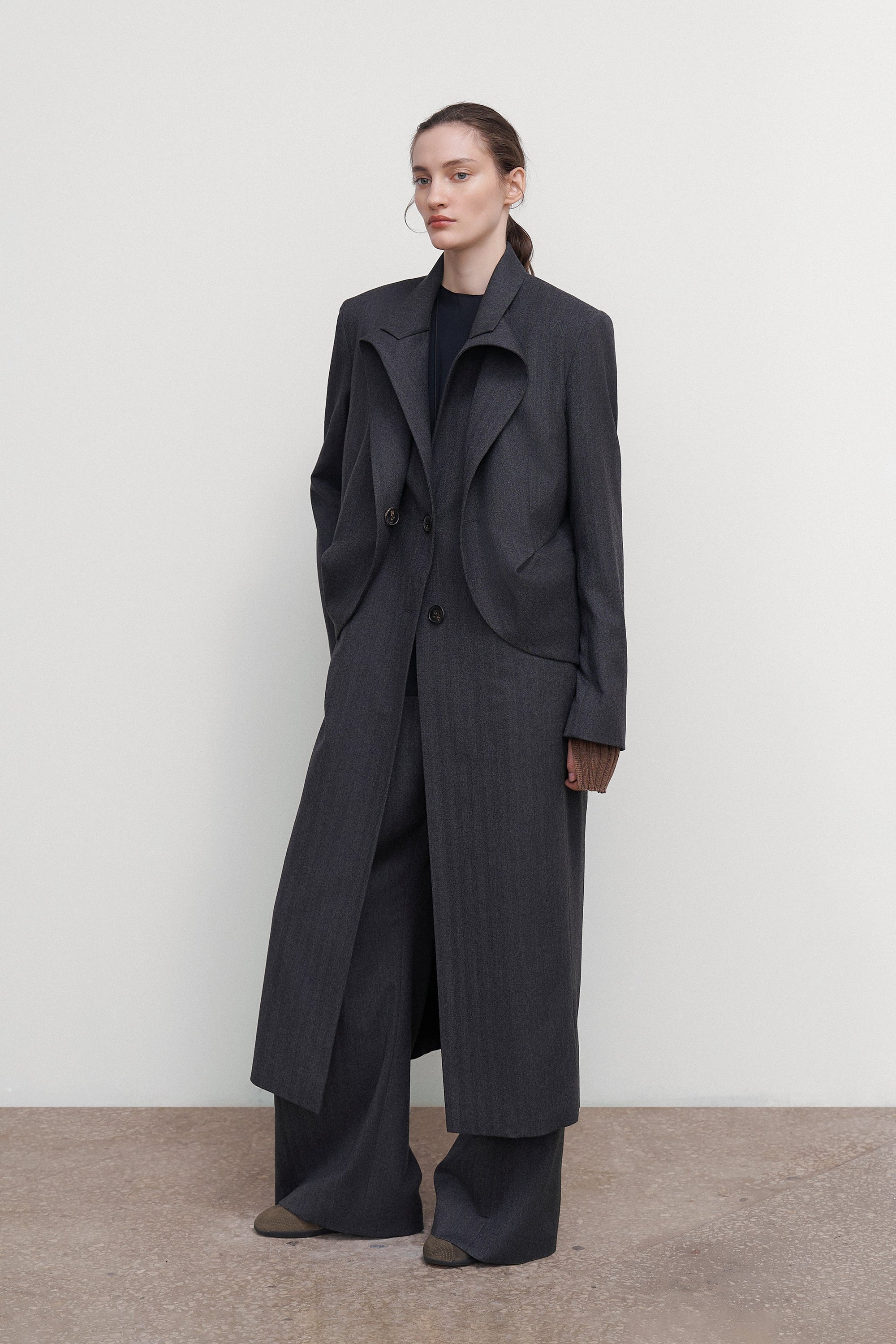 WOOL COAT WITH ANGULAR DETAILING