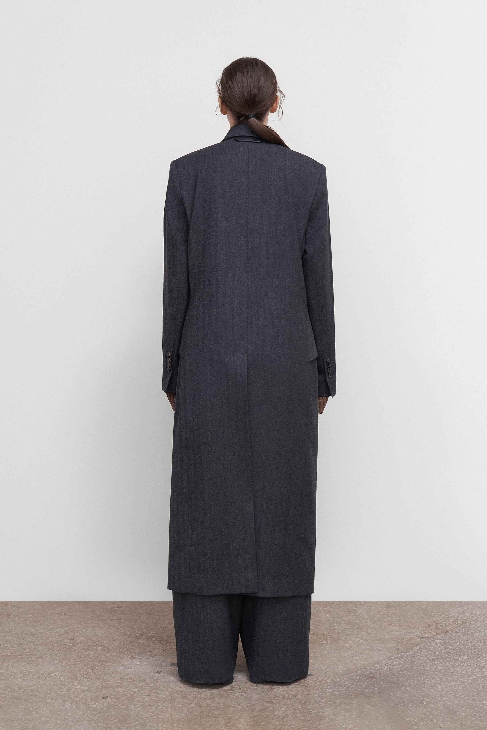WOOL COAT WITH ANGULAR DETAILING