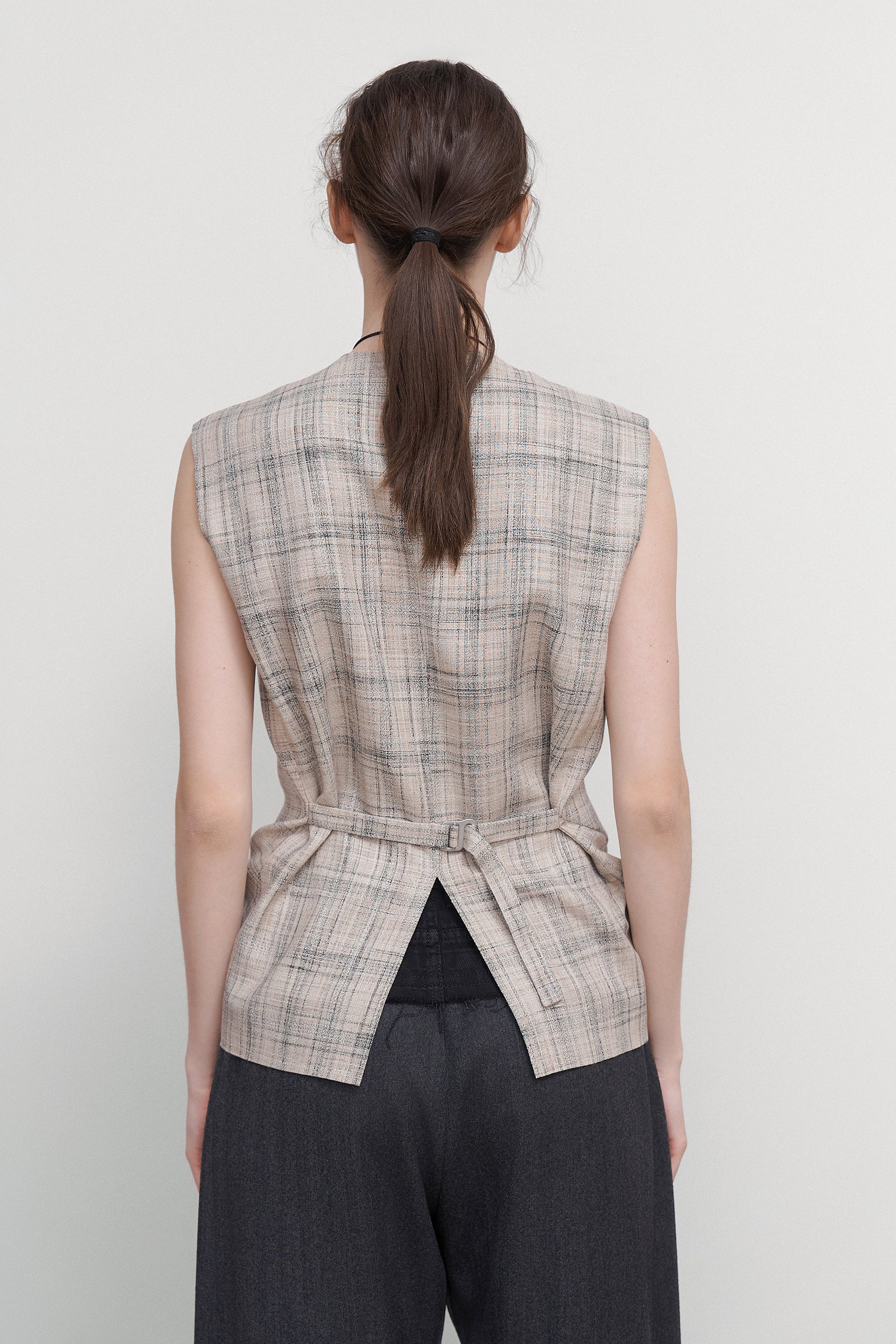 VEST WITH DRAPED SIDES