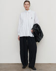 RUFFLE HIGH-RISE BIFLEX BARREL-LEG PANTS