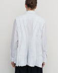 PEPLUM-PLEAT SHIRT