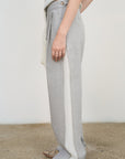 PANTS WITH FRAYED-EDGE SIDE STRIPES