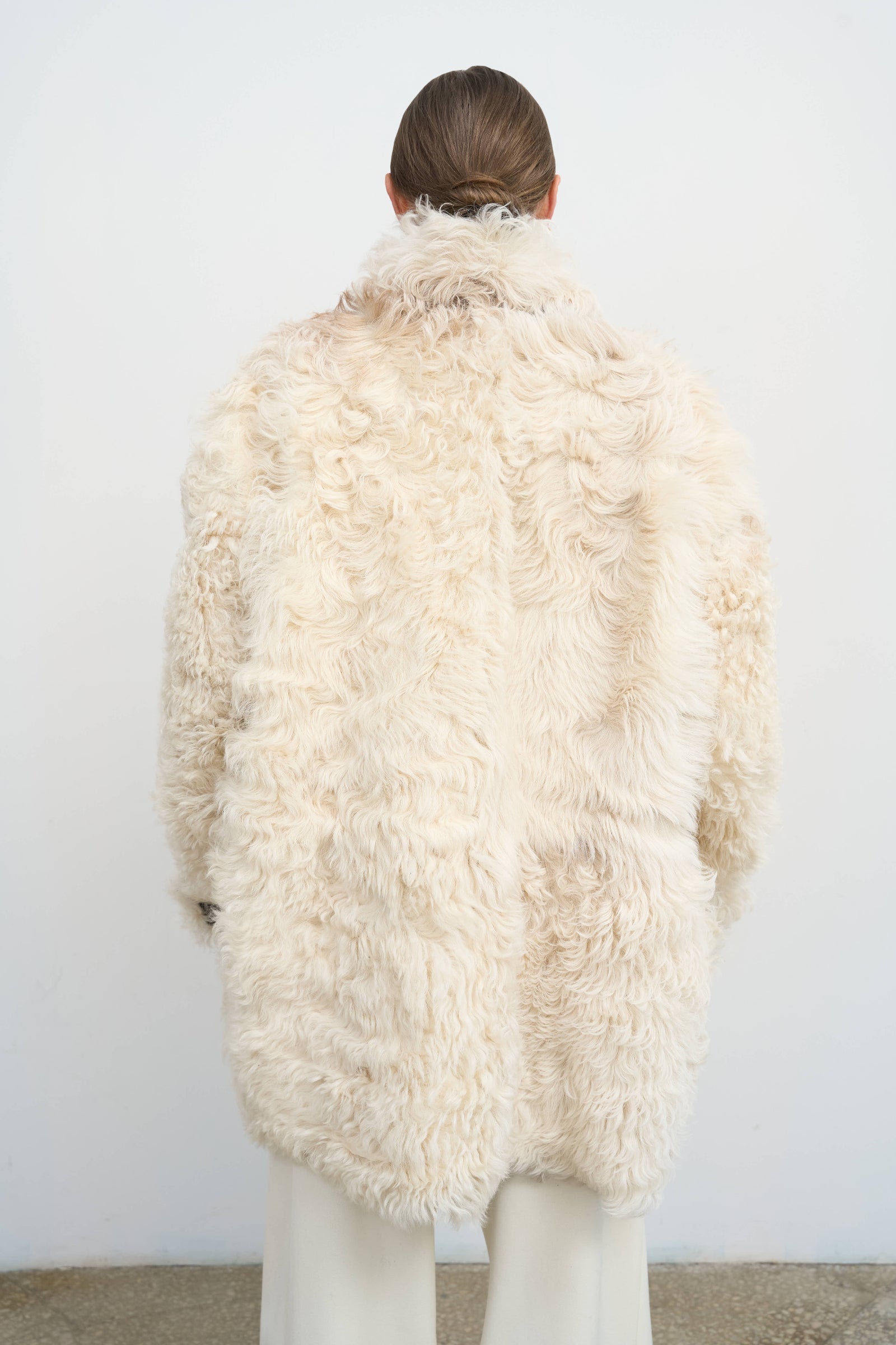 Двостороннє пальто зі стриженого хутра