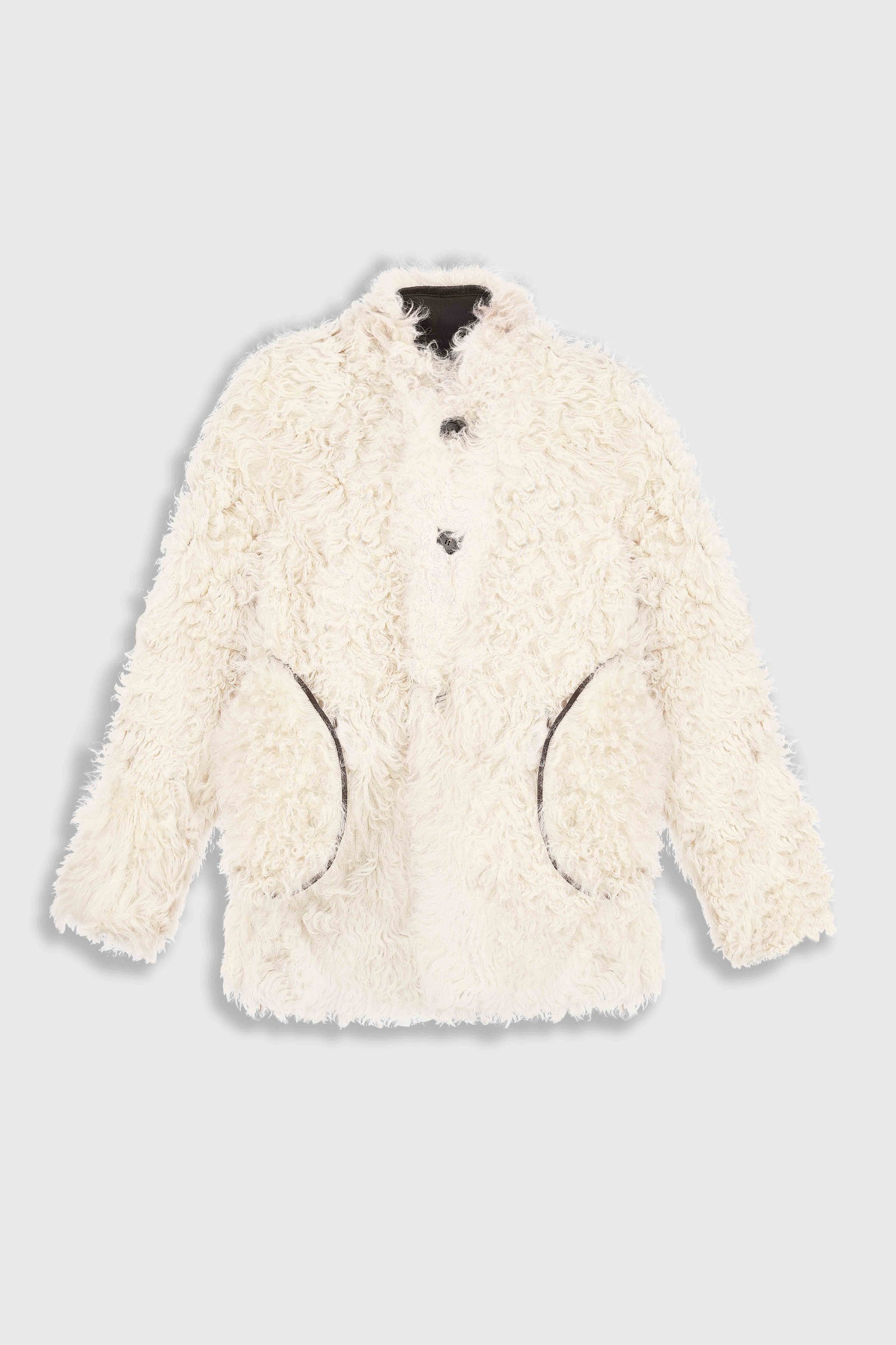 Двостороннє пальто зі стриженого хутра