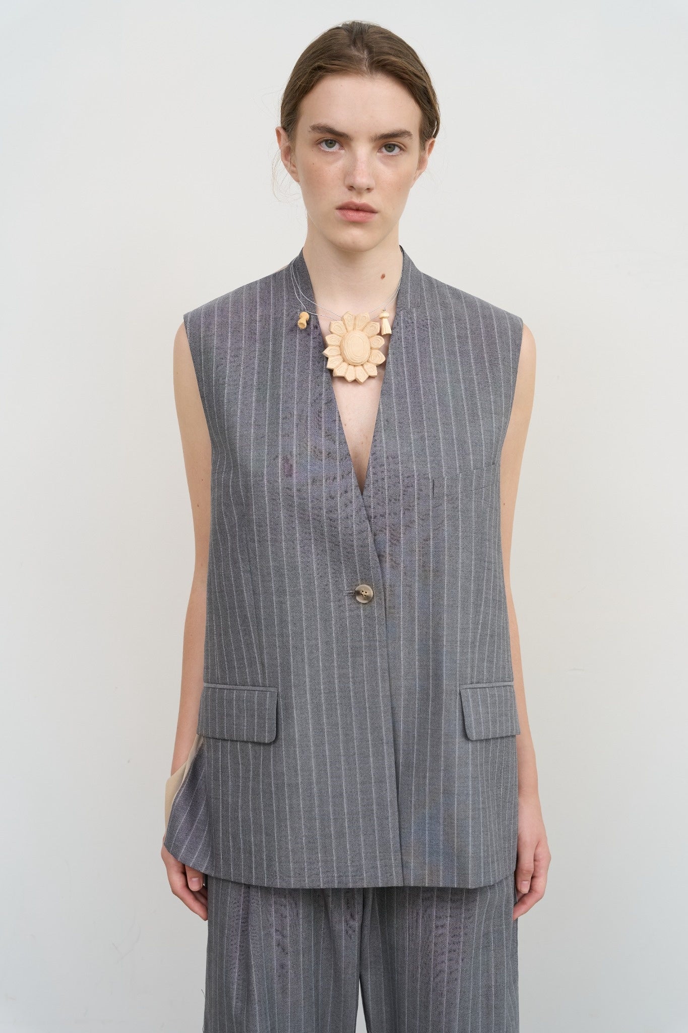 DECONSTRUCTED BOMBER-STYLE CAPE