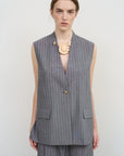 DECONSTRUCTED BOMBER-STYLE CAPE