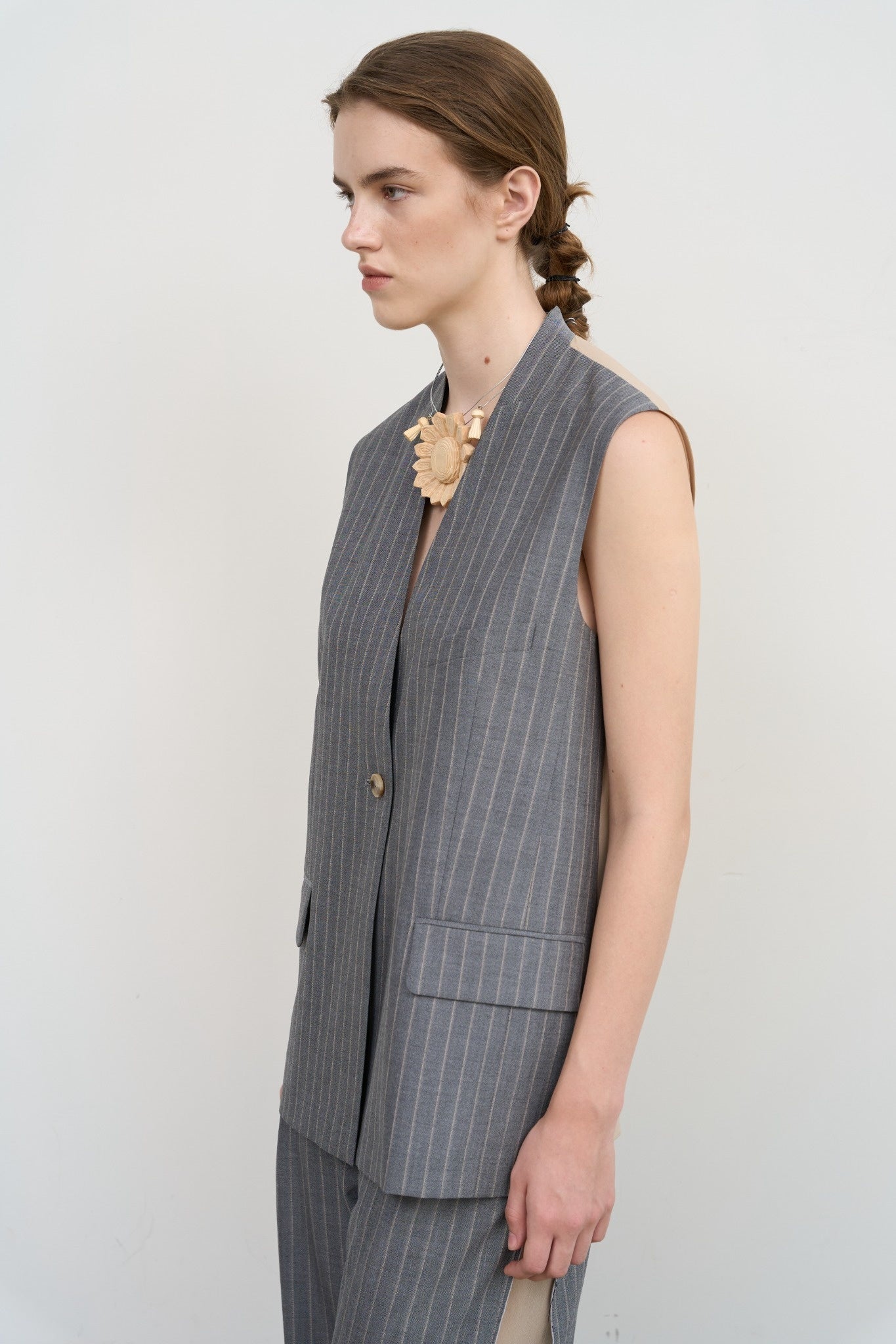 DECONSTRUCTED BOMBER-STYLE CAPE