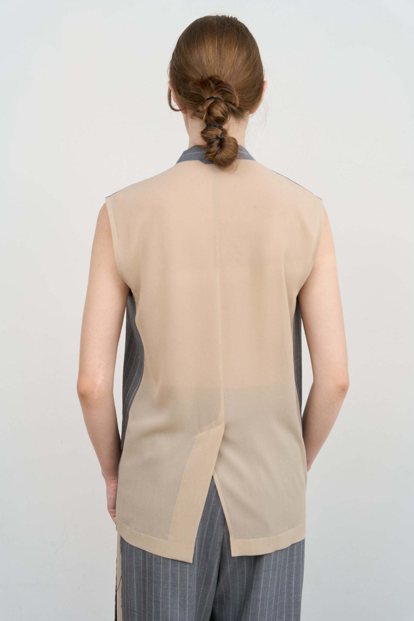 DECONSTRUCTED BOMBER-STYLE CAPE
