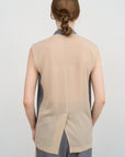 DECONSTRUCTED BOMBER-STYLE CAPE