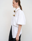 WHITE COTTON SHIRT WITH A TWISTED BACK