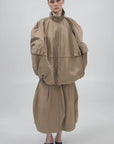 DECONSTRUCTED BOMBER-STYLE CAPE
